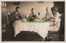Load image into Gallery viewer, Ancestors Postcard - Family Eating a Meal Together SW12924
