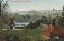 Load image into Gallery viewer, Vintage postcard of Alexandra Park, Hastings with a person looking towards the park.
