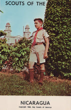 Load image into Gallery viewer, Scout standing outdoors with a building and trees in the background, labeled 'Scouts of the World, Nicaragua'.