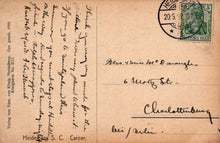 Load image into Gallery viewer, Vintage postcard with text and a stamp, featuring a green stamp on a brown background.