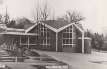 Load image into Gallery viewer, Black and white photograph of a modern church building with 'Cuffley Free Church' sign.