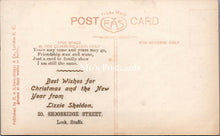 Load image into Gallery viewer, Greetings Postcard - A Christmas Greeting, Lady Wearing a Fancy Hat  SX140