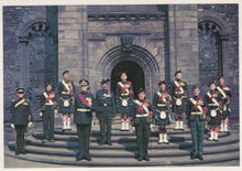 Load image into Gallery viewer, Formal group of men in uniform standing in front of a large stone building.