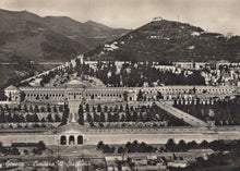 Load image into Gallery viewer, Vintage black and white photograph of a large cemetery with mountains in the background
