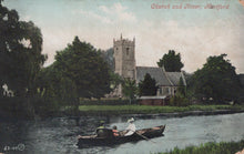 Load image into Gallery viewer, Vintage postcard of a church and river scene with people in a boat.