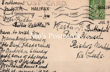 Load image into Gallery viewer, Vintage postcard with handwritten text and a stamp, featuring the brand 'Rito's Postcards'.
