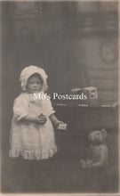 Load image into Gallery viewer, Ancestors Postcard - Young Child With Toys and a Teddy Bear SW18657