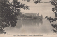 Load image into Gallery viewer, Vintage photograph of a castle or abbey across a body of water with trees framing the view.