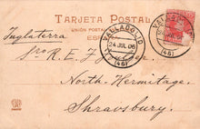 Load image into Gallery viewer, Vintage postcard with stamps and text, featuring a red stamp and black text on a brown background.
