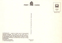 Load image into Gallery viewer, Back of a postcard with text and a logo on a white background