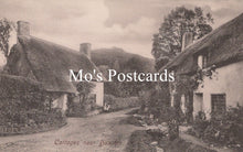 Load image into Gallery viewer, Vintage-style image of thatched cottages with 'Mo's Postcards' text overlay.