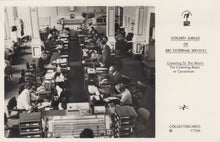 Load image into Gallery viewer, Vintage black and white photo of a busy office with people at desks, labeled 'Golden Jubilee of BBC External Services'.