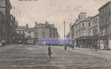 Load image into Gallery viewer, Vintage black and white photograph of a town square with people and buildings.