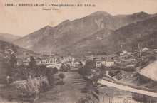 Load image into Gallery viewer, Vintage black and white postcard of a town with mountains in the background