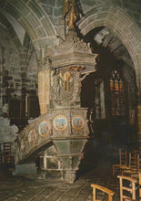 Load image into Gallery viewer, Decorative pulpit in a church with intricate carvings and statues.