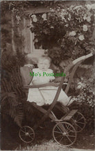 Load image into Gallery viewer, Children Postcard - Young Child in a Wooden Push Chair / Pram RS27599
