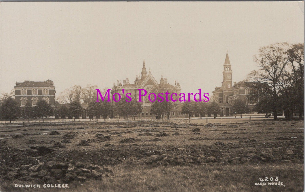 Vintage black and white photo of a large building with 'Mo's Postcards' text overlay