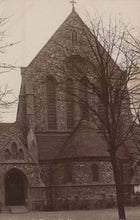Load image into Gallery viewer, Vintage photograph of a church with a prominent steeple and arched entrance.
