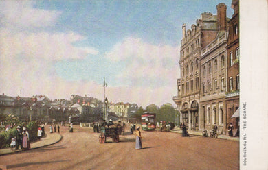 Vintage street scene with people, vehicles, and buildings in a town square.