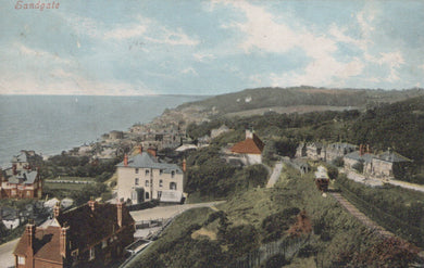 Village by the sea with houses and a coastal landscape.
