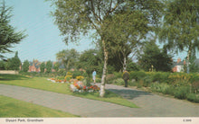 Load image into Gallery viewer, Scenic view of a park with trees, flowers, and a path in Dyrart Park, Grantham.

