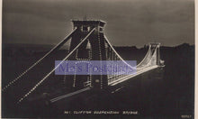 Load image into Gallery viewer, Black and white image of Clifton Suspension Bridge at night with visible text overlay.

