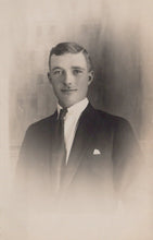 Load image into Gallery viewer, Vintage black and white portrait of a man in formal attire against a plain background
