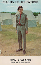 Load image into Gallery viewer, Scout in uniform standing in front of tents with &#39;Scouts of the World&#39; and &#39;New Zealand&#39; text.
