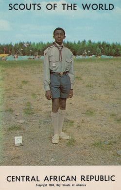 Scout in uniform standing outdoors with 'Scouts of the World' and 'Central African Republic' text.