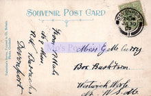 Load image into Gallery viewer, Vintage souvenir postcard with handwritten text and a stamp, featuring the word &#39;Devonport&#39;.

