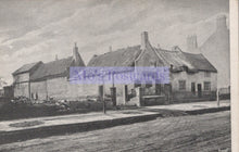 Load image into Gallery viewer, Vintage black and white photograph of a row of houses with a prominent sign in the center.
