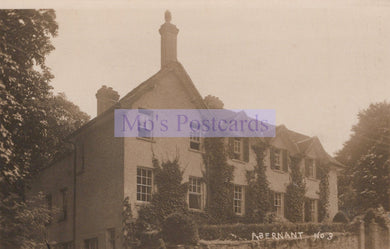 Vintage photograph of a large house with 'Mo's Postcards' watermark