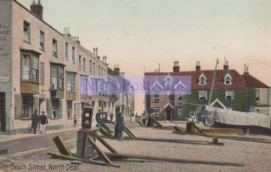 Vintage postcard of Beach Street, North Deal with buildings and a boat.