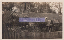Load image into Gallery viewer, Vintage black and white photograph of a house with a picket fence and trees.

