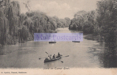 Vintage postcard of a scene on the Tumut River with people in boats, surrounded by trees.