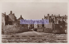 Load image into Gallery viewer, Vintage black and white photo of a coastal scene with houses and a path.
