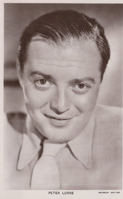 Black and white portrait of a man with a blurred background