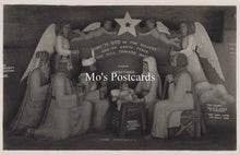 Load image into Gallery viewer, Black and white nativity scene with angelic figures and text 
