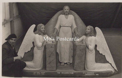 Vintage postcard with a religious scene featuring a man and two angels, labeled 'The Resurrection'.