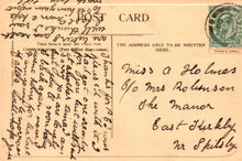 Load image into Gallery viewer, Vintage postcard with handwritten text and a stamp on an orange background
