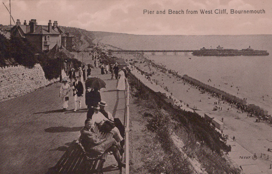 Vintage postcard of a pier and beach from West Cliff, Bournemouth