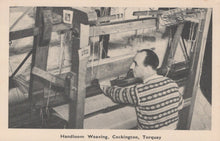 Load image into Gallery viewer, Person operating a handloom with text &#39;Handloom Weaving, Cockington, Torquay&#39; at the bottom.
