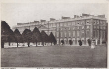 Load image into Gallery viewer, Historical black and white photograph of a large mansion with a well-manicured lawn and trees.
