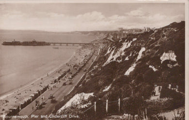 Vintage black and white photograph of Bournemouth Pier and Undercliff Drive with a coastal view.