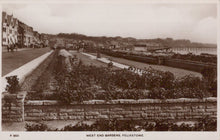 Load image into Gallery viewer, Vintage black and white photograph of West End Gardens in Felixstowe, showing a garden with stone walls and a view of the town.
