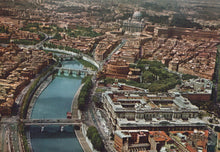 Load image into Gallery viewer, Aerial view of a cityscape with a river and prominent buildings, including a basilica.
