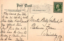 Load image into Gallery viewer, Vintage postcard with handwritten text and postage stamp, featuring a flag design.
