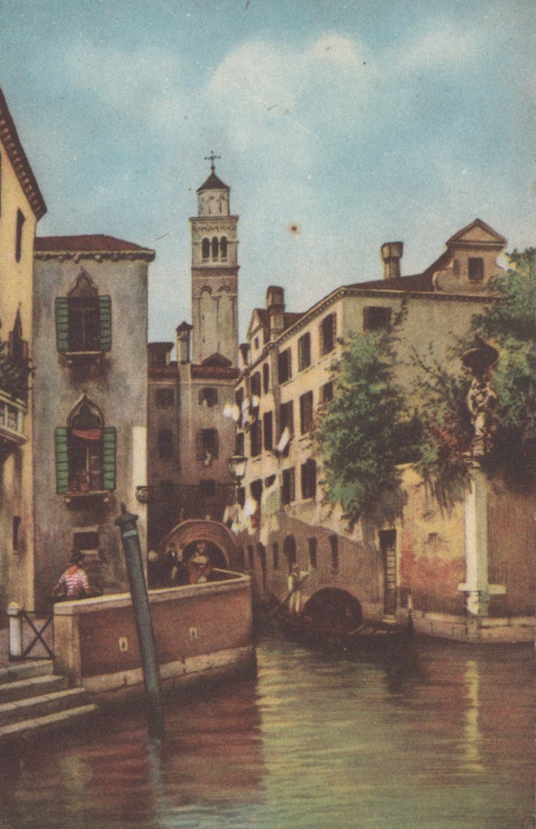 Venetian canal scene with buildings and a bell tower.