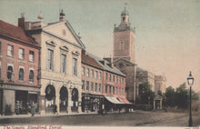 Load image into Gallery viewer, Vintage postcard of a town square with a clock tower and buildings.
