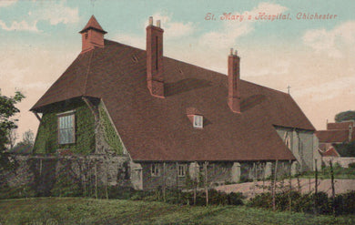 Historic building with a red roof and stone walls, labeled 'St. Mary's Hospital, Chichester'.
